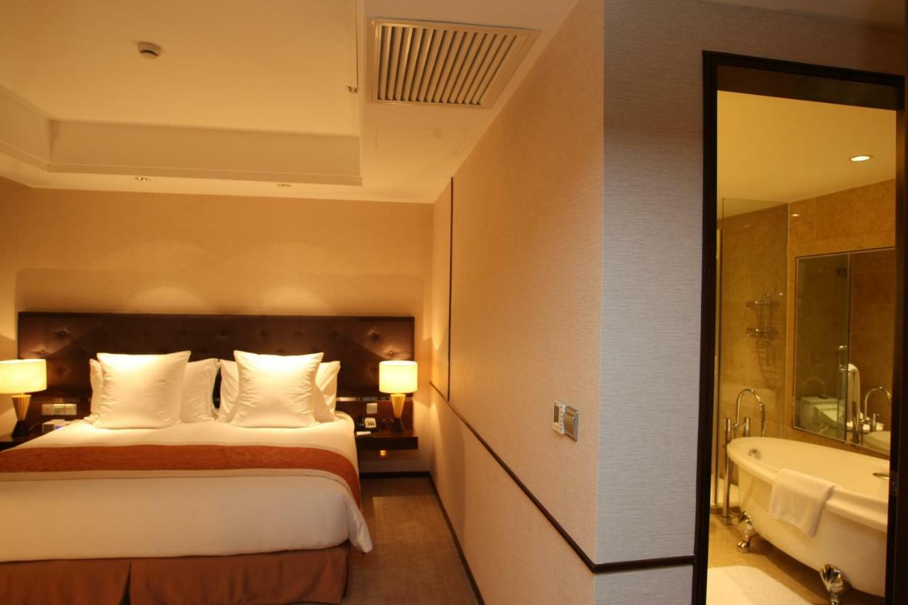Millennium Hotel Wuxi Уси Стая снимка